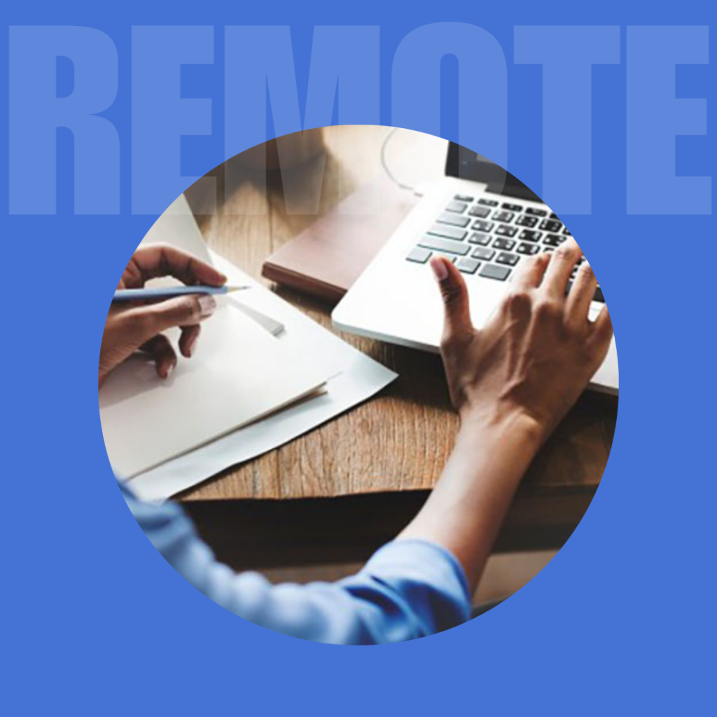 A woman is working on a computer remotely.