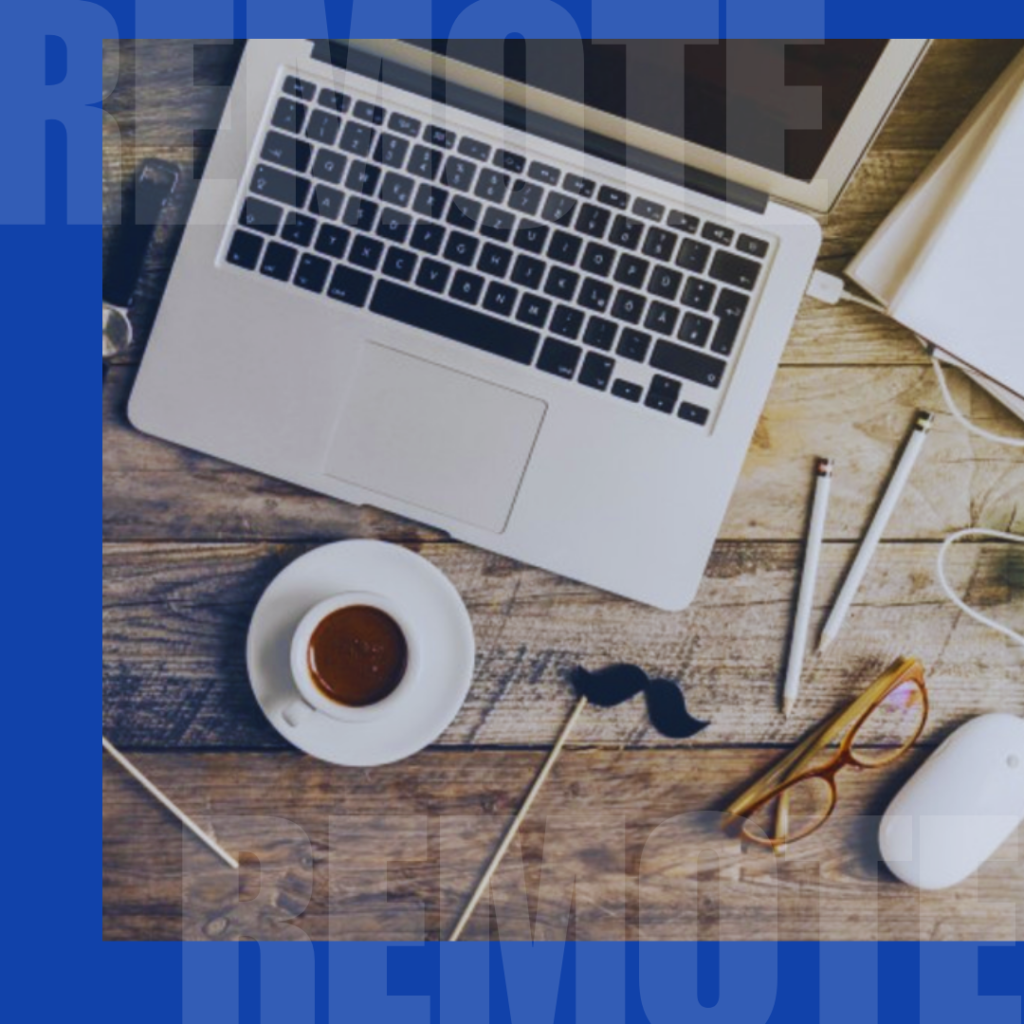 Computer, coffee, stationery on the table